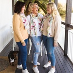 Load image into Gallery viewer, 3 pretty ladies standing on balcony laughing and wearing the Oatley Bay scarf
