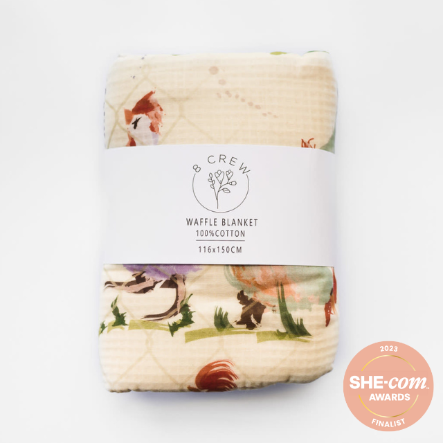 Waffle blanket with farm animal design in packaging