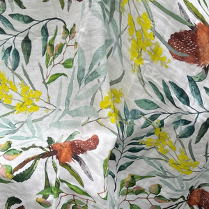 Baby swaddle with Australian native flora wattle and banksia design