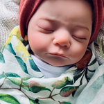 Load image into Gallery viewer, Close up of baby swaddled in Gungah Bay wrap
