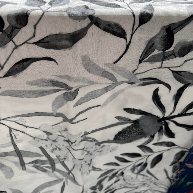 Close up of native Australian flora printed scarf in neutral grey scale colours