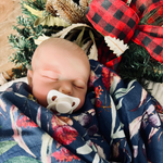 Load image into Gallery viewer, Newborn baby wrapped in baby swaddle with Christmas print
