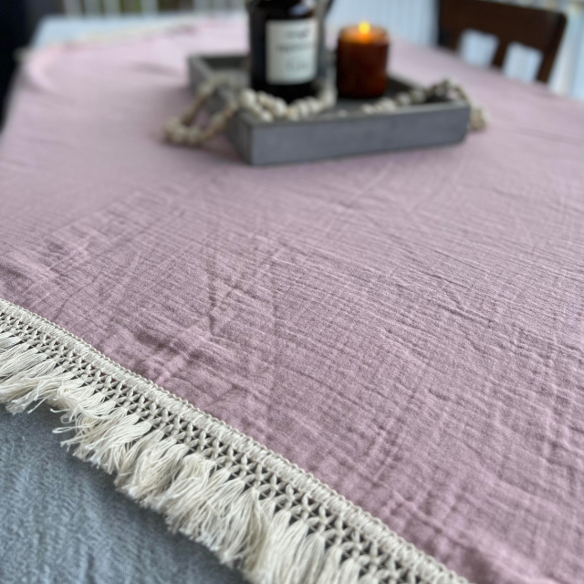 Dusty pink table cloth with fringing