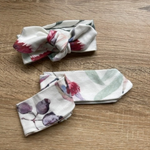 Load image into Gallery viewer, Baby headbands shown 2 ways; one in a bow and one folded over
