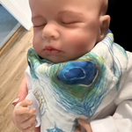 Load image into Gallery viewer, Baby wearing peacock feather print bib
