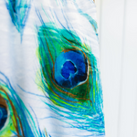 Load image into Gallery viewer, Close up of peacock feathers design on scarf in blue and green colours
