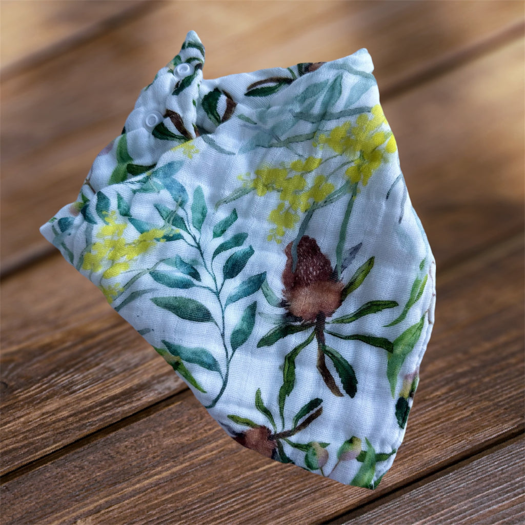 Baby bib and pet bandana in native Australian flora design with wattle and banksia